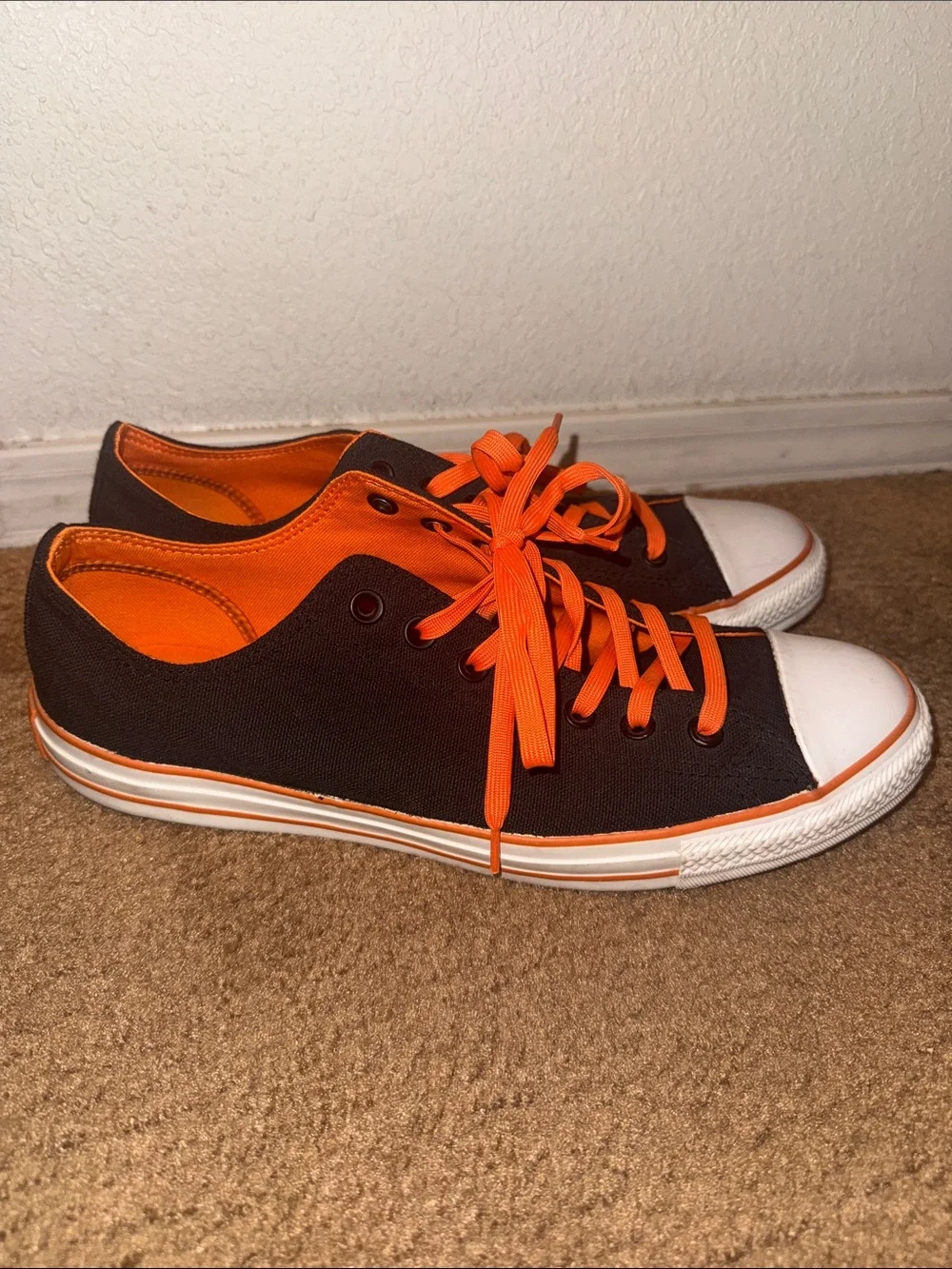 Converse Black Canvas Low-Top Sneakers with Bright Orange Laces